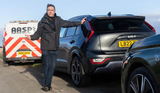 Pete Gibson with Kia Niro Hybrid being recovered